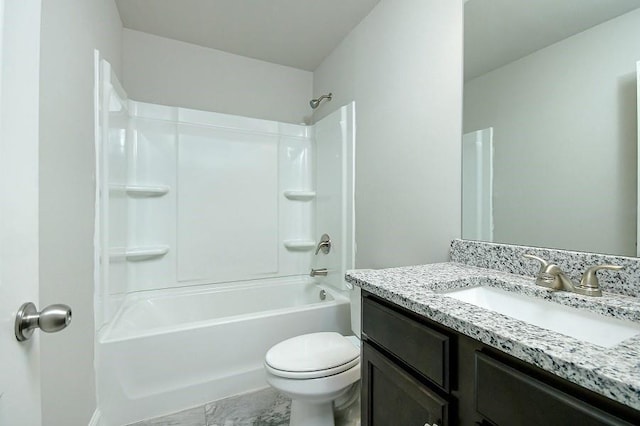 bathroom with toilet, vanity, and bathing tub / shower combination