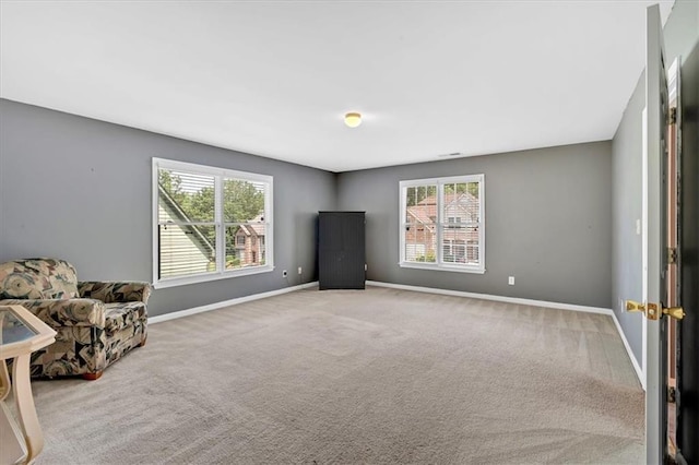 1331 Red Hill Rd, Marietta, GA 30008 - living area with plenty of natural light and carpet flooring
