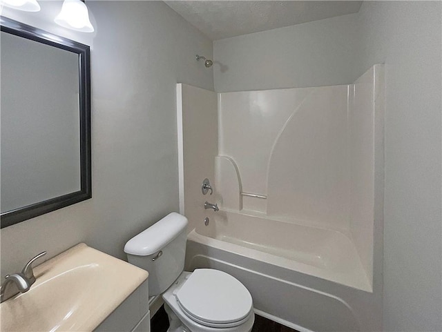 full bath with vanity, toilet, and  shower combination