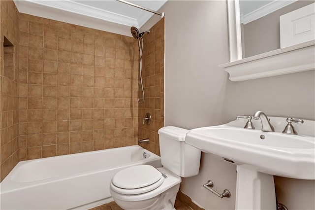 full bathroom with crown molding, washtub / shower combination, and toilet