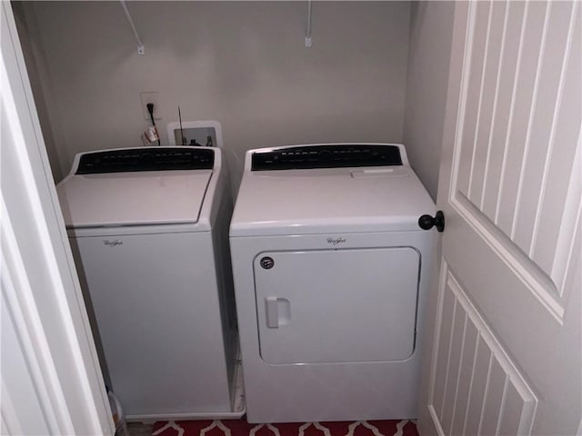 laundry area featuring laundry area and washing machine and clothes dryer