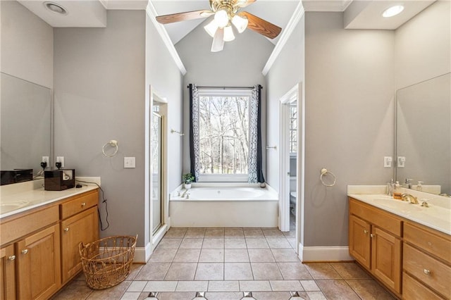 bathroom featuring baseboards, toilet, ornamental molding, tile patterned floors, and vanity