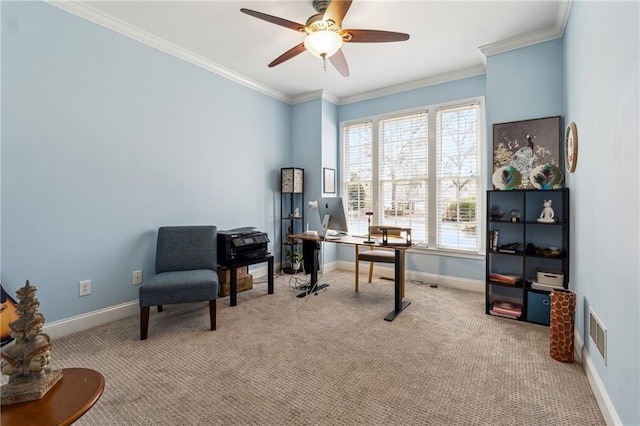 office featuring light carpet, ornamental molding, visible vents, and baseboards