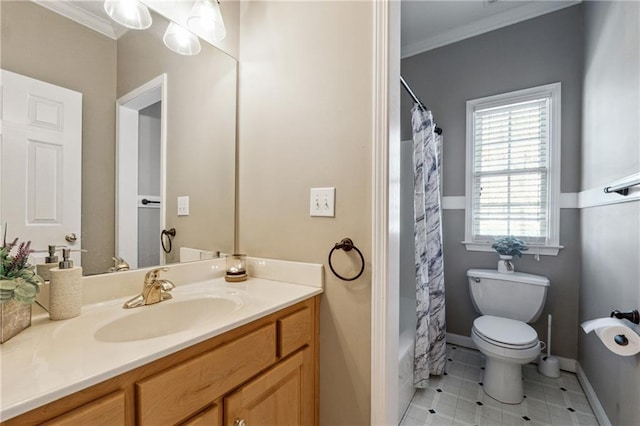 bathroom with toilet, ornamental molding, shower / bath combo, vanity, and baseboards