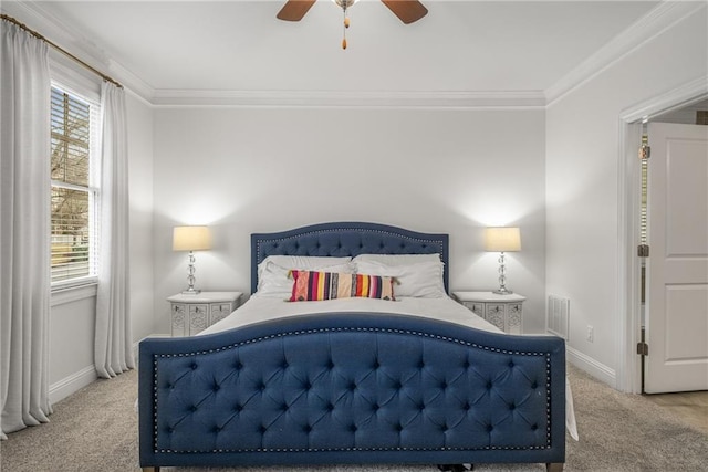 bedroom with light carpet, visible vents, and crown molding