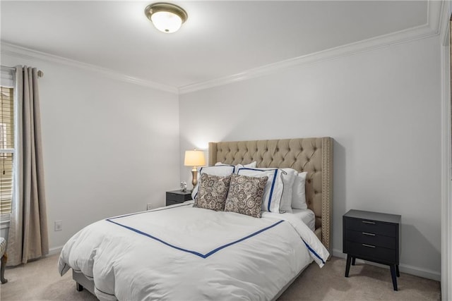 bedroom with baseboards, crown molding, and carpet