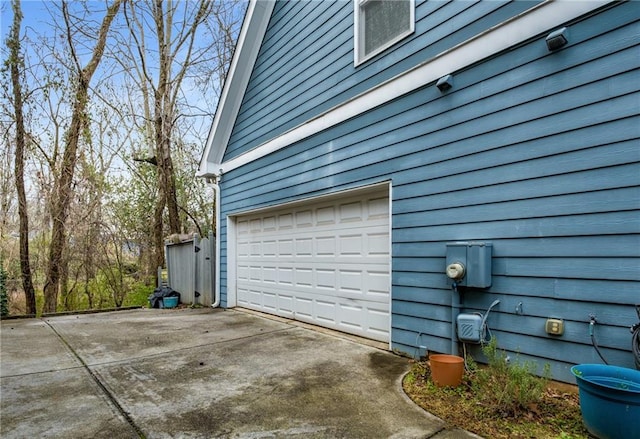 garage with driveway