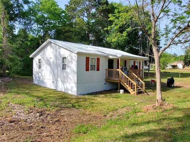 exterior space with a lawn