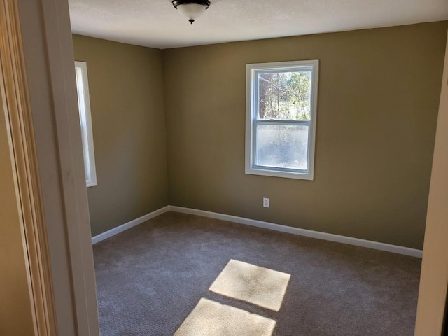 view of carpeted spare room