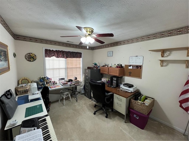 office featuring light carpet, a ceiling fan, visible vents, and a textured ceiling