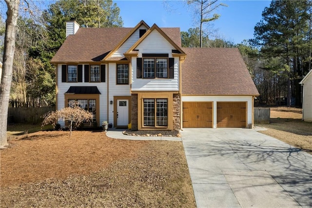 view of front of property featuring a garage