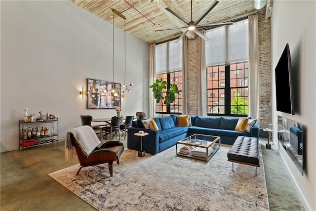 170 Boulevard Se E120, Atlanta, GA 30312 - living area with a towering ceiling, finished concrete floors, plenty of natural light, ceiling fan, and wooden ceiling