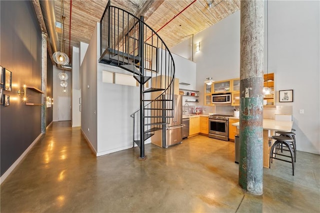 170 Boulevard Se E120, Atlanta, GA 30312 - interior space featuring a high ceiling, finished concrete floors, stairway, and wooden ceiling