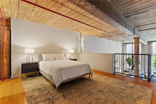 170 Boulevard Se E120, Atlanta, GA 30312 - bedroom with a wooden ceiling with exposed beams and wood finished floors