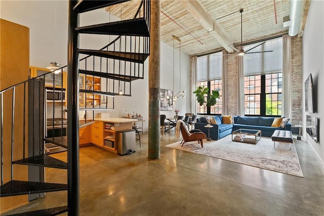 170 Boulevard Se E120, Atlanta, GA 30312 - building lobby with a high ceiling, stairway, and beamed ceiling