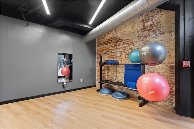 170 Boulevard Se E120, Atlanta, GA 30312 - workout area featuring wood finished floors and brick wall