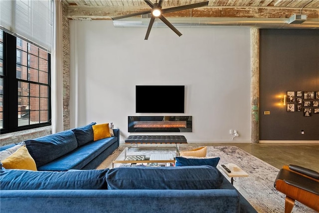 170 Boulevard Se E120, Atlanta, GA 30312 - living room with ceiling fan, a towering ceiling, wooden ceiling, and a glass covered fireplace