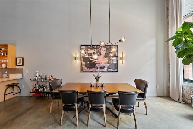 170 Boulevard Se E120, Atlanta, GA 30312 - dining area with finished concrete floors and a towering ceiling