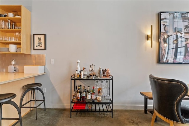 170 Boulevard Se E120, Atlanta, GA 30312 - indoor dry bar with backsplash and unfinished concrete floors