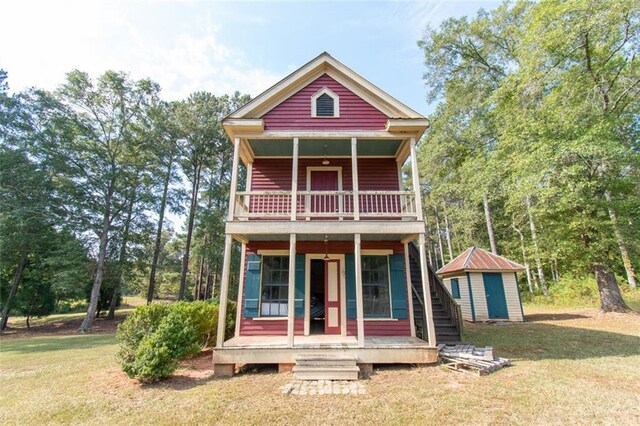 view of front of home featuring a porch and a front yard