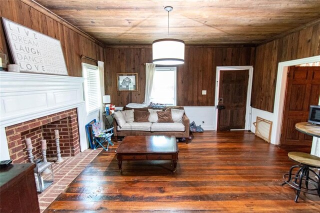 living room featuring wood ceiling, wooden walls, and dark hardwood / wood-style flooring