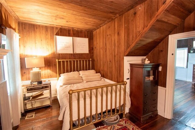 bedroom featuring dark wood-type flooring, wood walls, vaulted ceiling, and wood ceiling