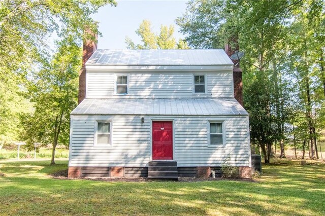 view of front of home featuring a front yard