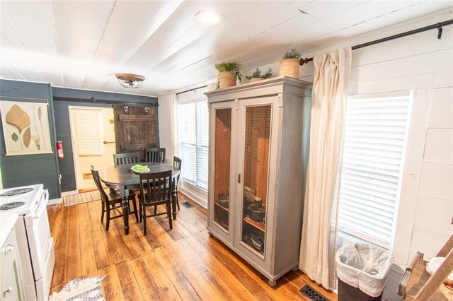 dining area with light wood-type flooring