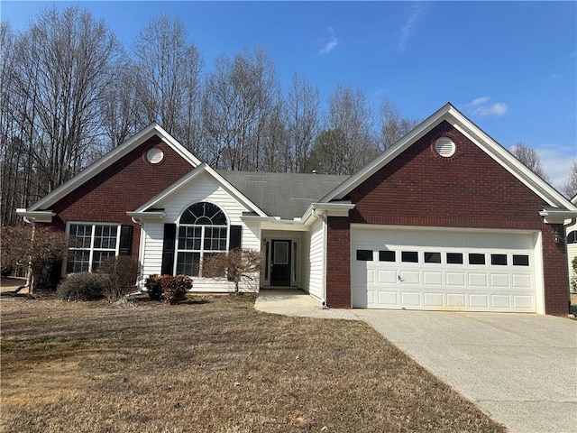 ranch-style house with brick siding, driveway, and an attached garage