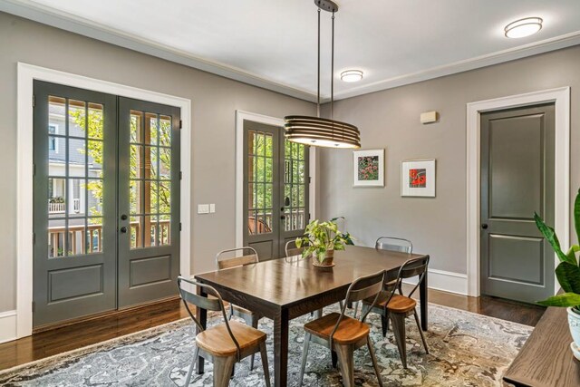970 N Ormewood Park Dr SE, Atlanta, GA 30316 - dining space featuring french doors, dark wood-style floors, baseboards, and crown molding