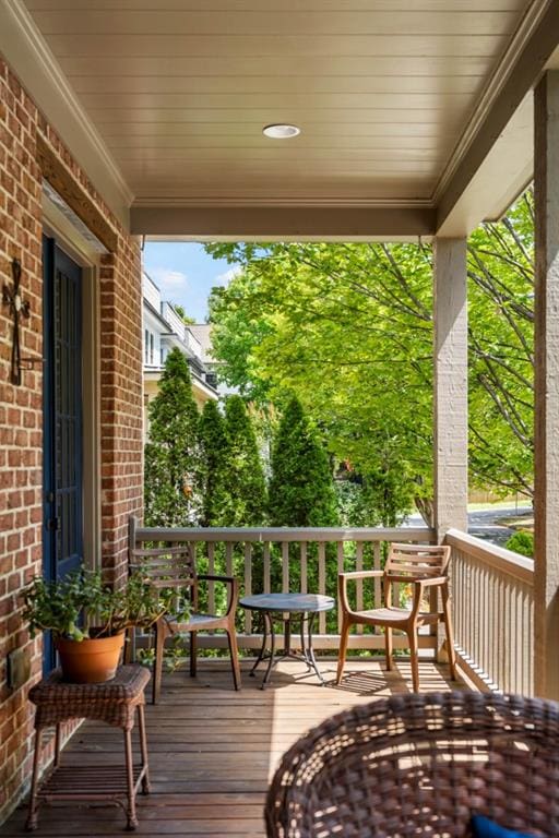 970 N Ormewood Park Dr SE, Atlanta, GA 30316 - wooden deck featuring covered porch