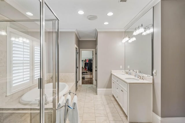 970 N Ormewood Park Dr SE, Atlanta, GA 30316 - full bath with a garden tub, double vanity, ornamental molding, marble look tiles, and recessed lighting