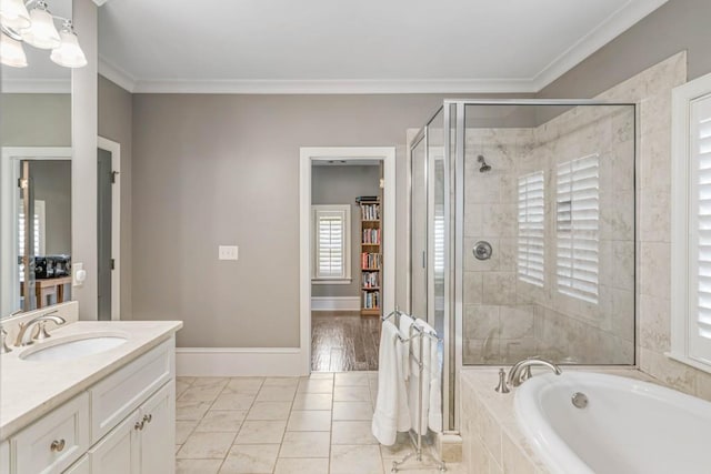 970 N Ormewood Park Dr SE, Atlanta, GA 30316 - bathroom featuring a stall shower, ornamental molding, a bath, vanity, and baseboards