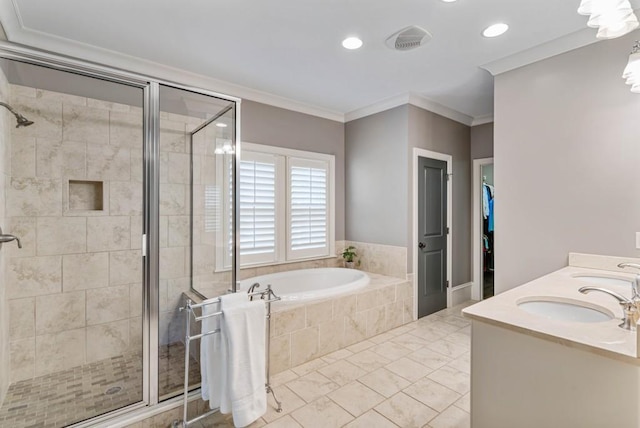 970 N Ormewood Park Dr SE, Atlanta, GA 30316 - bathroom with a stall shower, a bath, ornamental molding, a sink, and recessed lighting
