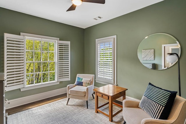 970 N Ormewood Park Dr SE, Atlanta, GA 30316 - sitting room featuring baseboards, a ceiling fan, and wood finished floors