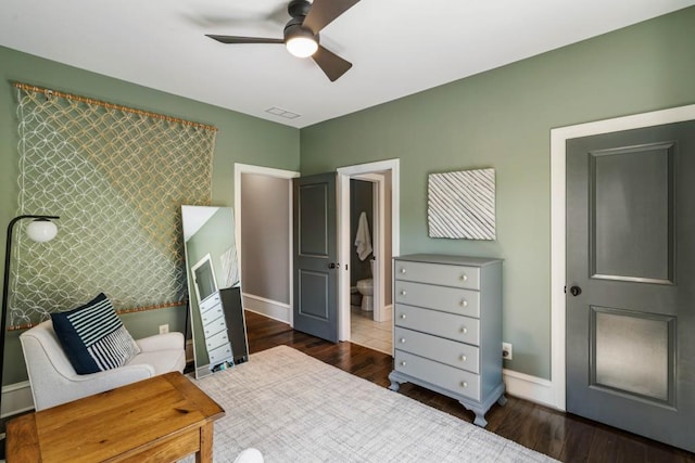970 N Ormewood Park Dr SE, Atlanta, GA 30316 - bedroom featuring wood finished floors, baseboards, and ensuite bath