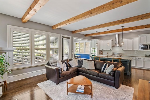 970 N Ormewood Park Dr SE, Atlanta, GA 30316 - living area with beam ceiling, dark wood-style floors, and baseboards