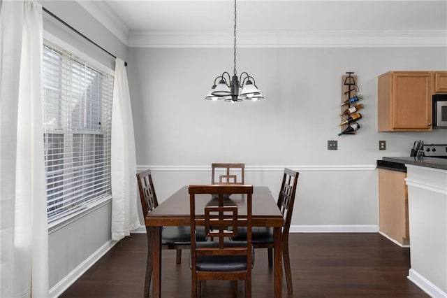 dining space featuring an inviting chandelier, ornamental molding, and dark hardwood / wood-style flooring