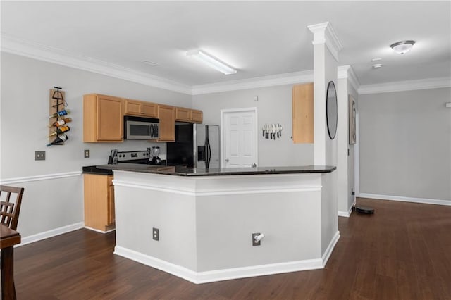 kitchen featuring ornamental molding, appliances with stainless steel finishes, dark hardwood / wood-style floors, and kitchen peninsula