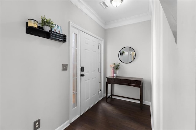 entryway featuring ornamental molding and dark hardwood / wood-style floors