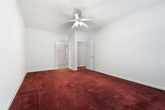 unfurnished bedroom featuring ceiling fan and carpet flooring