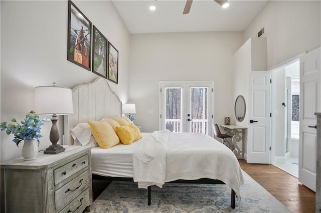 living room featuring dark wood-style floors, visible vents, baseboards, recessed lighting, and ceiling fan with notable chandelier