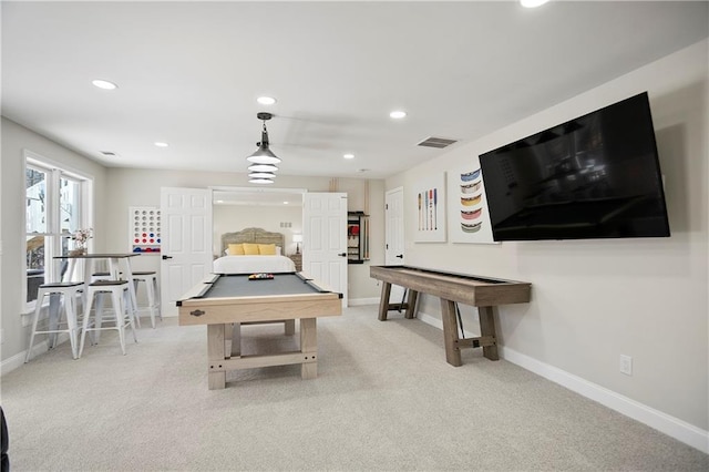 bedroom with visible vents, baseboards, dark wood finished floors, a high ceiling, and a ceiling fan