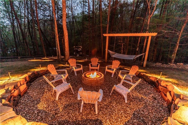 view of patio featuring an outdoor fire pit