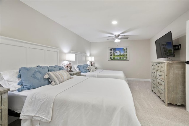 living area featuring recessed lighting, french doors, light colored carpet, and baseboards