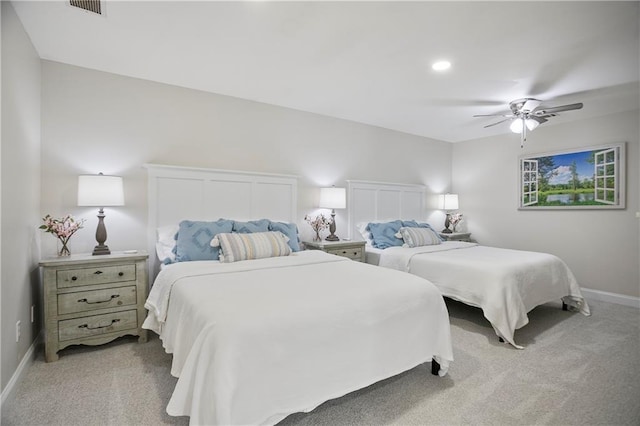 living room featuring light colored carpet, recessed lighting, and baseboards