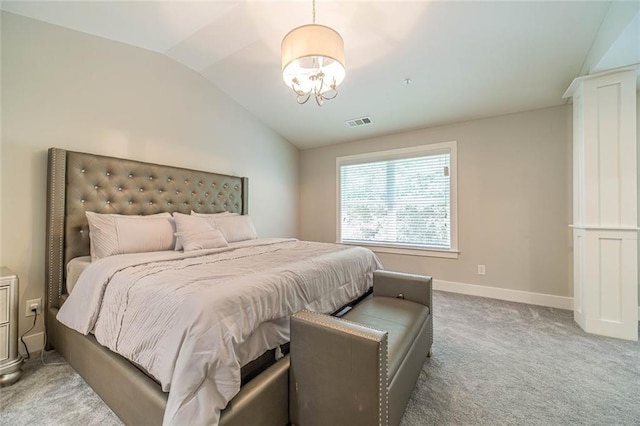 bedroom featuring lofted ceiling, light colored carpet, and an inviting chandelier