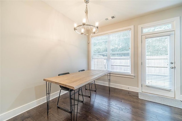 office featuring a notable chandelier and dark hardwood / wood-style flooring