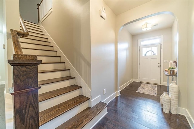 foyer with dark hardwood / wood-style flooring