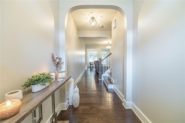 hallway featuring dark hardwood / wood-style flooring